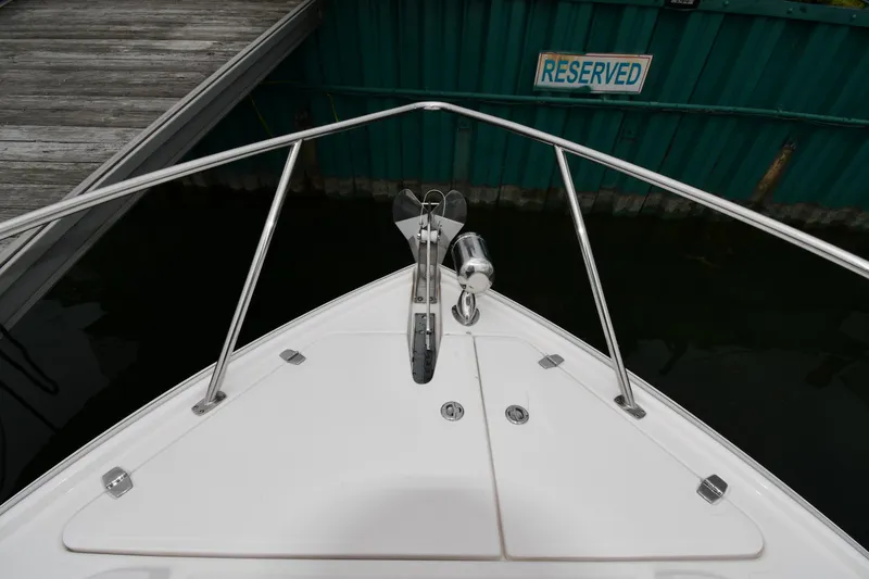 Slide: The Image of Bow of 2021 Regal 35 Sport Coupe at reserved dock space. - 3