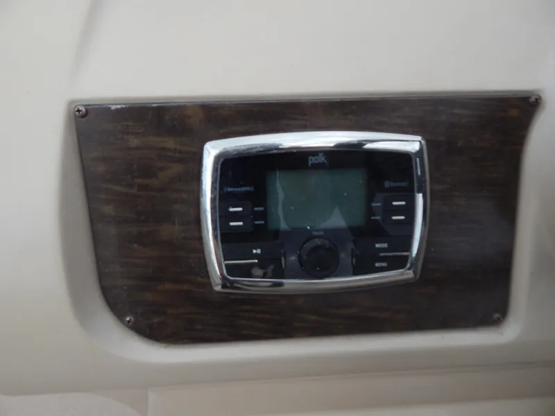 Slide: The Image of Control panel on 2016 Cypress Cay Seabreeze 230 boat dashboard. - 22