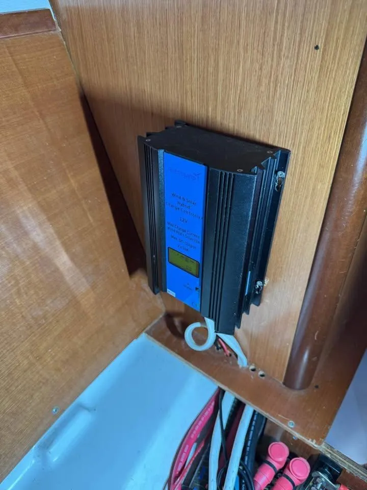 Slide: The Image of Electrical panel inside 2008 Beneteau Oceanis Clipper 343 sailboat, featuring wiring and control unit. - 10