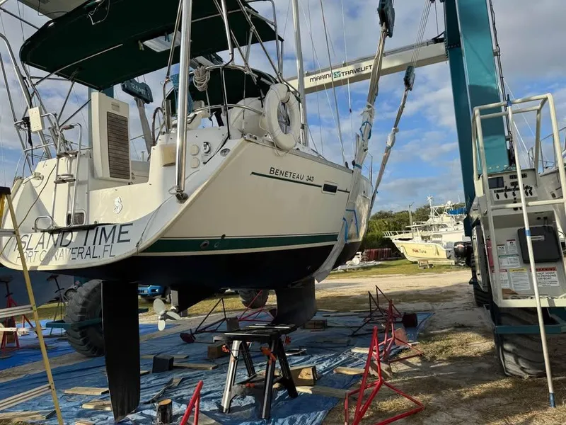 Slide: The Image of Beneteau Oceanis Clipper 343 sailboat in dry dock, 2008 model, undergoing maintenance. - 2