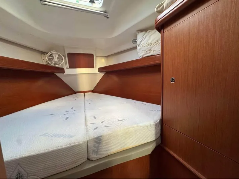 Slide: The Image of Interior cabin of 2008 Beneteau Oceanis Clipper 343 sailboat with cozy bedding. - 4