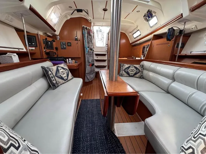 Slide: The Image of Interior of 2008 Beneteau Oceanis Clipper 343 sailboat with elegant seating and wood finish. - 8