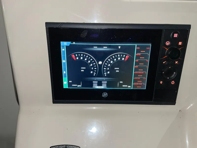 Slide: The Image of Dashboard display of a 2019 Boston Whaler 315 Conquest boat. - 27