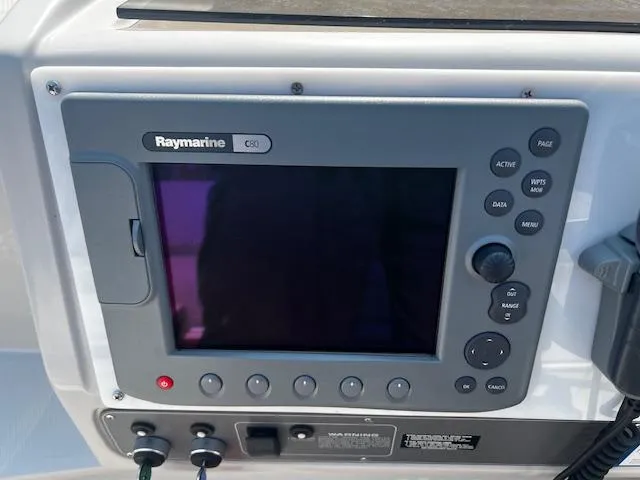 Slide: The Image of Raymarine C80 marine display on 1994 Regal 322 Commodore boat dashboard. - 12