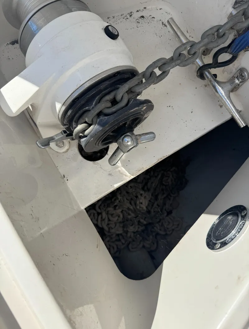 Slide: The Image of Anchor chain mechanism on a 1994 Regal 322 Commodore boat. - 14