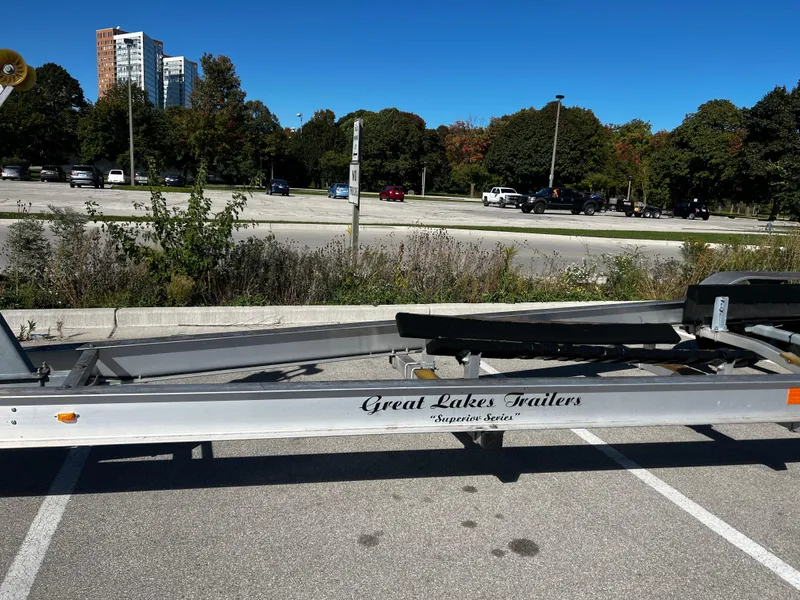 Slide: The Image of Trailer for 1994 Regal 322 Commodore in parking lot, Great Lakes Trailers branding visible. - 36