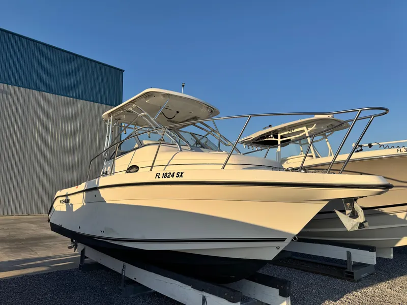 Slide: The Image of 2008 Century 2400 Walkaround boat on display, featuring sleek design and sturdy build. - 6