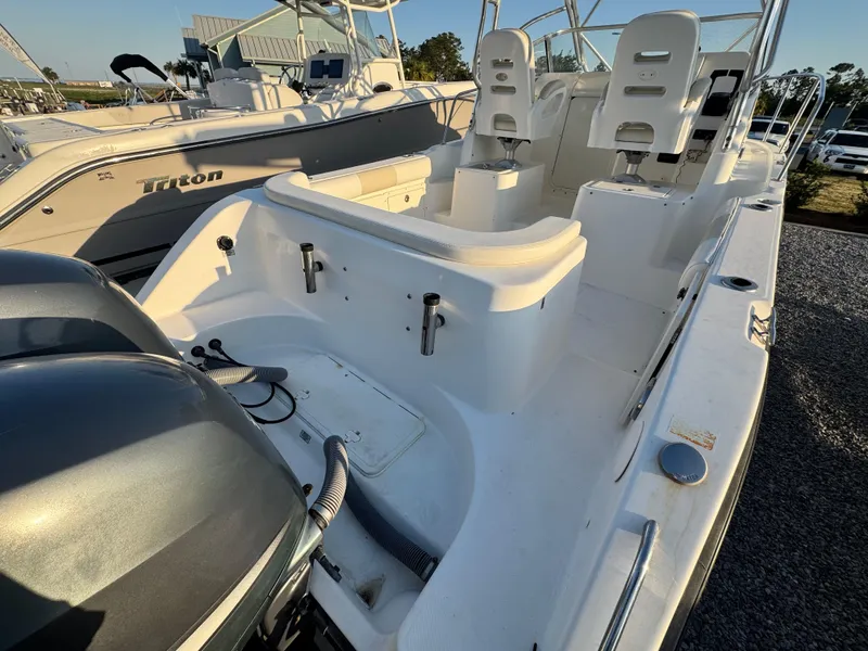 Slide: The Image of 2008 Century 2400 Walkaround boat with dual engines and spacious seating area. - 8