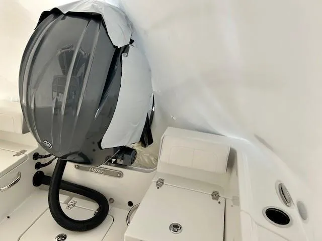 Slide: The Image of 2024 Parker 1801 Center Console boat engine and seating area. - 16