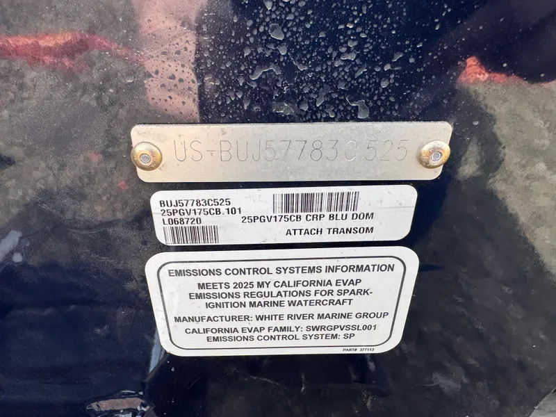 Slide: The Image of 2025 Tracker Pro Guide V-175 Combo boat transom with emissions control information plate. - 17