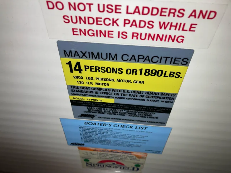 Slide: The Image of Bennington 2275RL 2003 capacity label: 14 persons or 1890 lbs, 130 HP motor. - 18