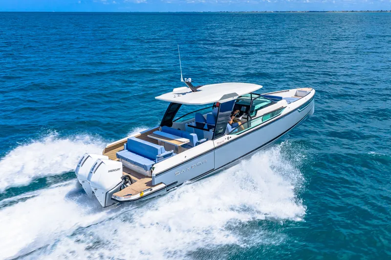 Slide: The Image of Saxdor 320 GTO 2026 cruising on open sea, modern design. - 20