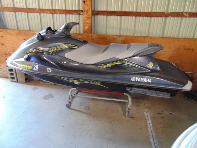 The Image of 2014 Yamaha WaveRunner VX jet ski in a garage setting. - 1