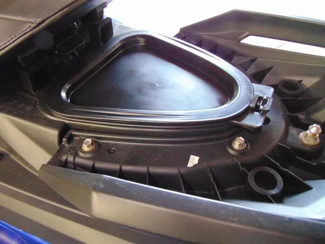 Slide: The Image of 2024 Yamaha Waverunner GP SVHO storage compartment detail with audio system. - 12