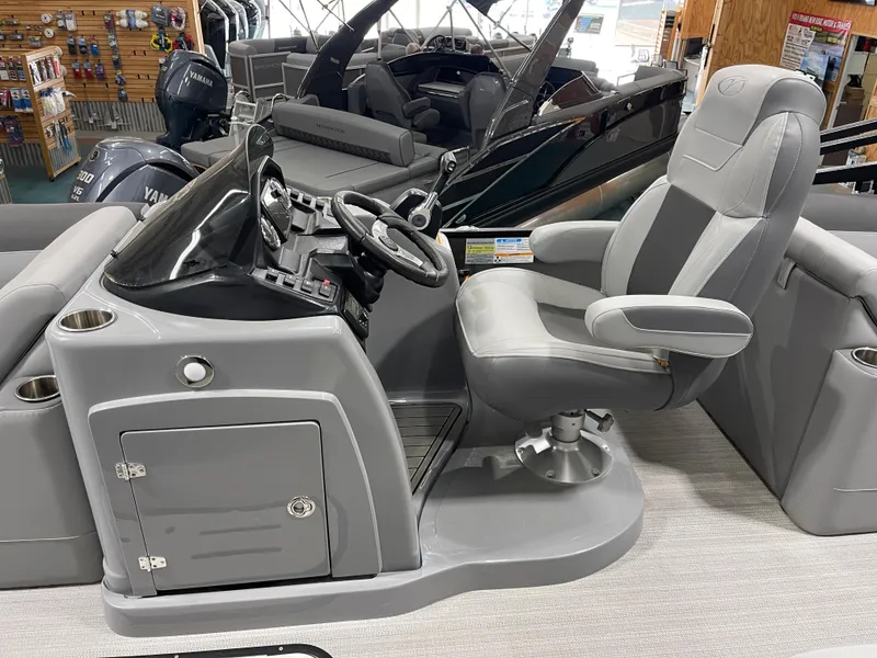 Slide: The Image of Captain's chair and console of 2021 Veranda VR22RC boat, featuring sleek design and controls. - 13