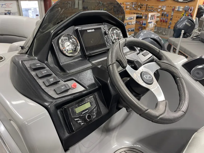 Slide: The Image of Dashboard of 2021 Veranda VR22RC boat with steering wheel and control panel. - 15