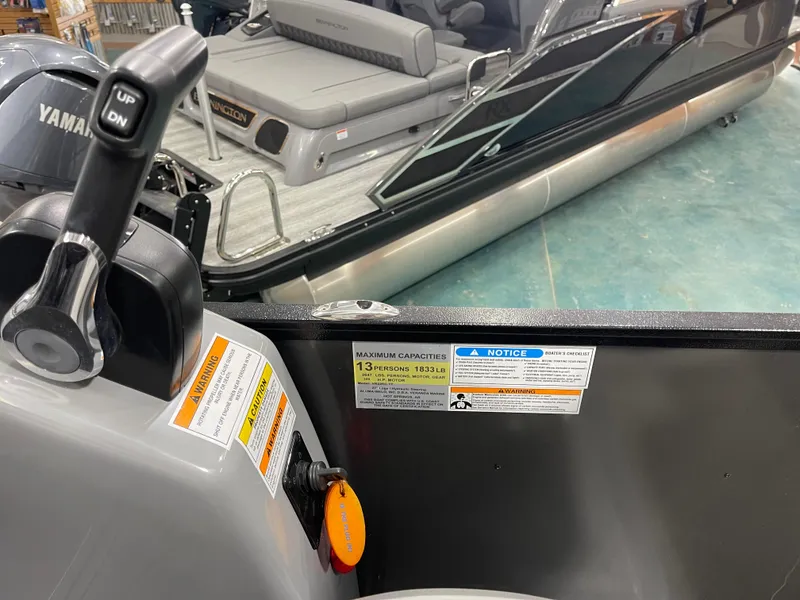 Slide: The Image of Control panel of a 2021 Veranda VR22RC boat with capacity warnings and Yamaha engine. - 16