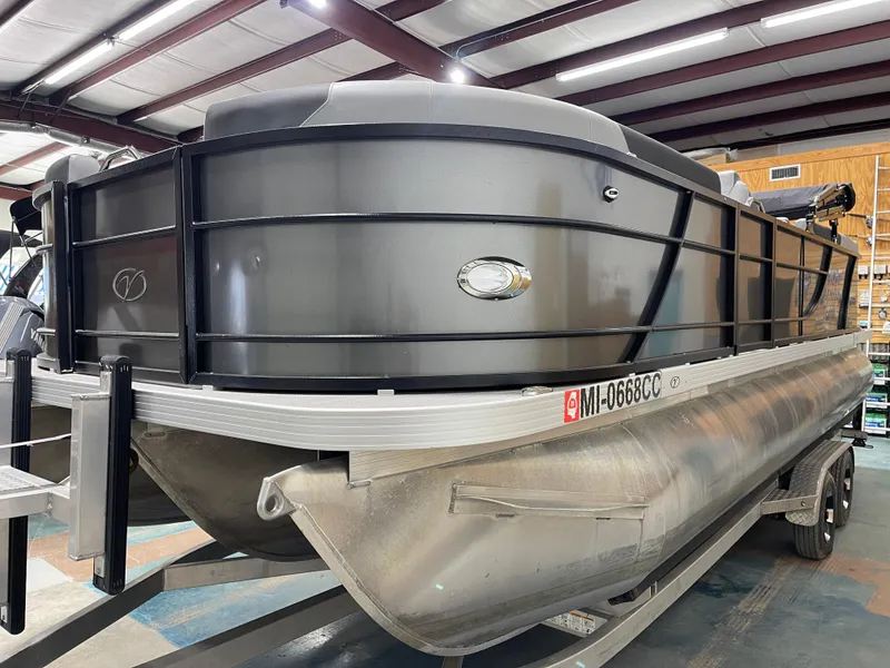 Slide: The Image of 2021 Veranda VR22RC pontoon boat in a showroom, showcasing sleek design and sturdy construction. - 7