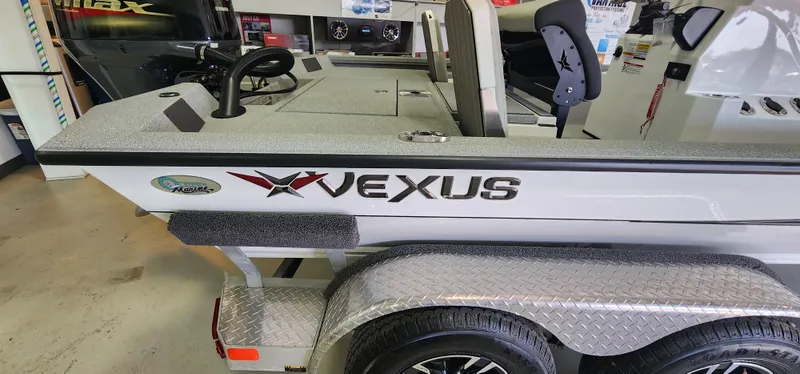 Slide: The Image of 2025 Vexus ACX2000 boat on trailer, featuring sleek design and modern equipment. - 15