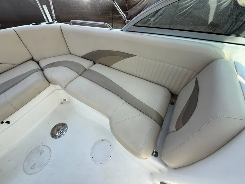 Slide: The Image of 2014 NauticStar 203DC Sport Deck boat interior with beige seating and modern design. - 46