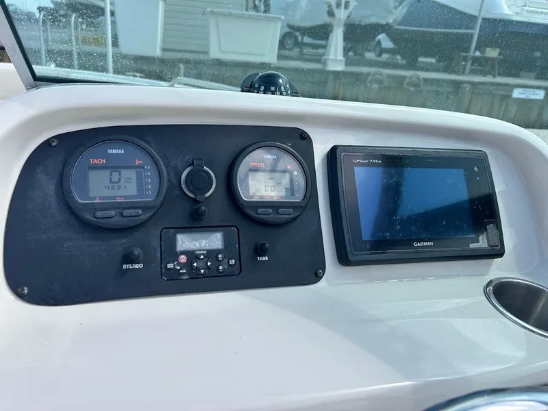Slide: The Image of Dashboard of 2014 Robalo R227 boat with Yamaha gauges and Garmin display. - 11
