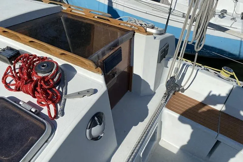 Slide: The Image of Cockpit of 1988 Kirie 286 sailboat with ropes and winch. - 25