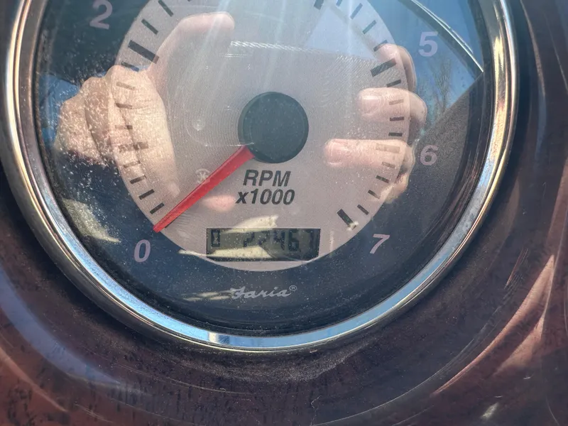 Slide: The Image of Close-up of a 2008 Godfrey AquaPatio 22 RPM gauge, showing a reading of 3.5 x 1000 RPM. - 15
