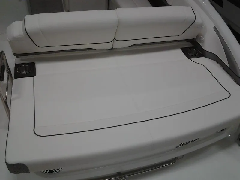 Slide: The Image of 2018 Formula 310 Bowrider boat with spacious rear seating and sleek design. - 13