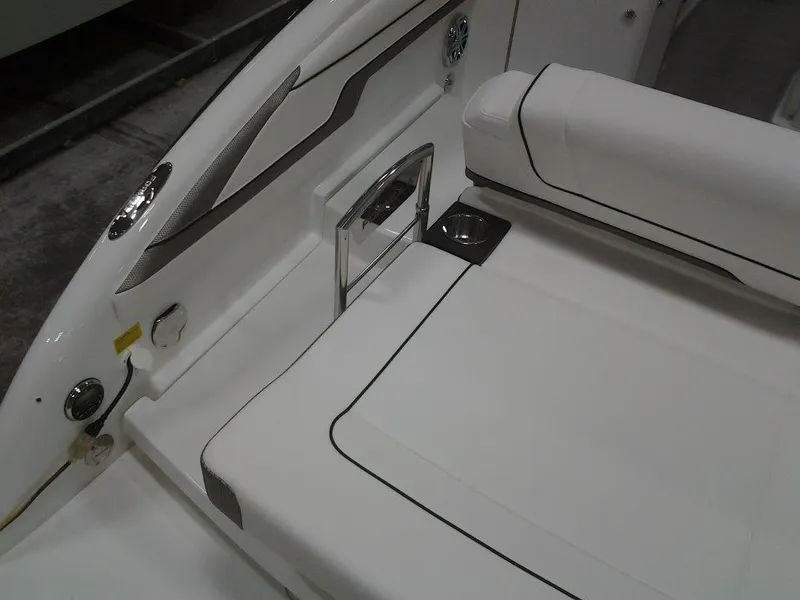 Slide: The Image of 2018 Formula 310 Bowrider interior seating with sleek white upholstery and modern design. - 14