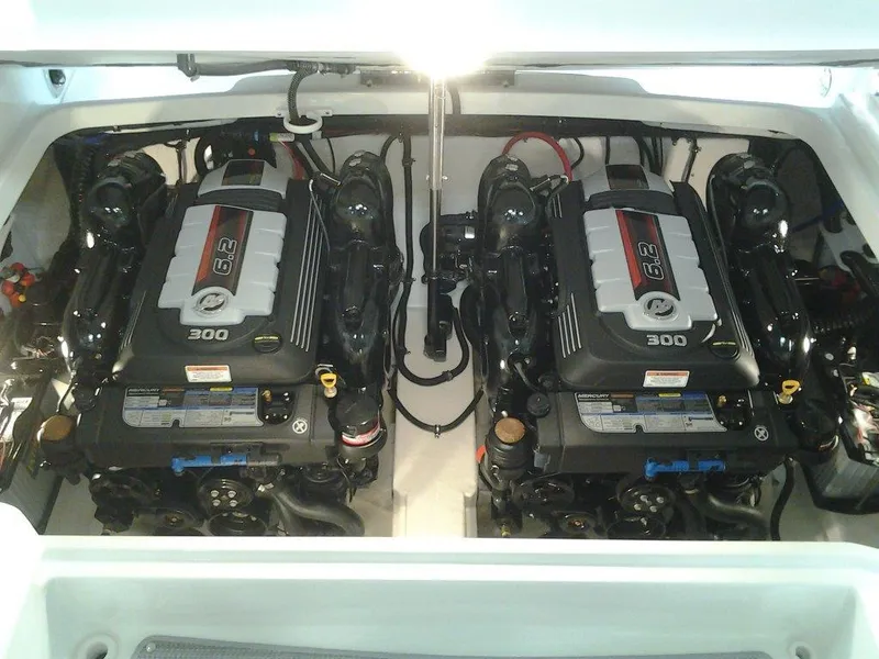 Slide: The Image of Twin engines in a 2018 Formula 310 Bowrider boat engine compartment. - 16