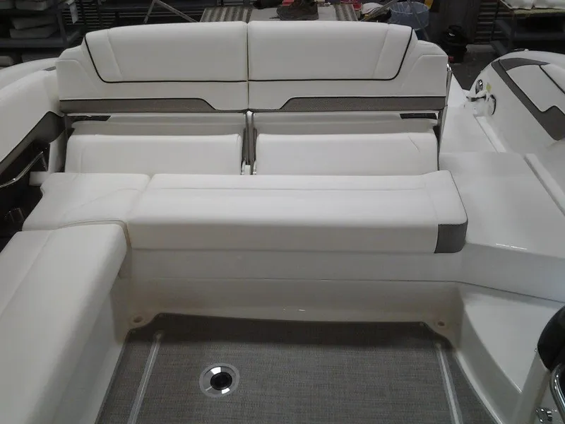 Slide: The Image of 2018 Formula 310 Bowrider interior with white seating and gray flooring. - 20