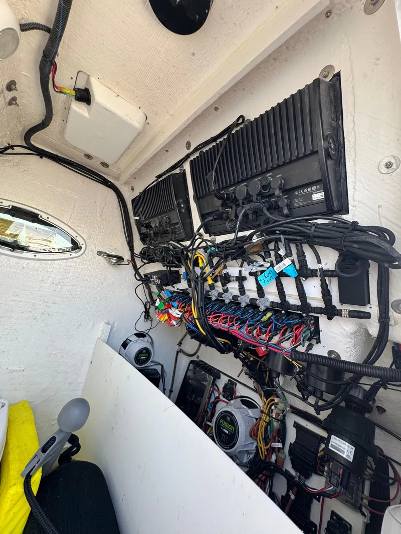 Slide: The Image of Interior view of 2023 Twin Vee 280 GFX CC boat's electrical system and wiring. - 31