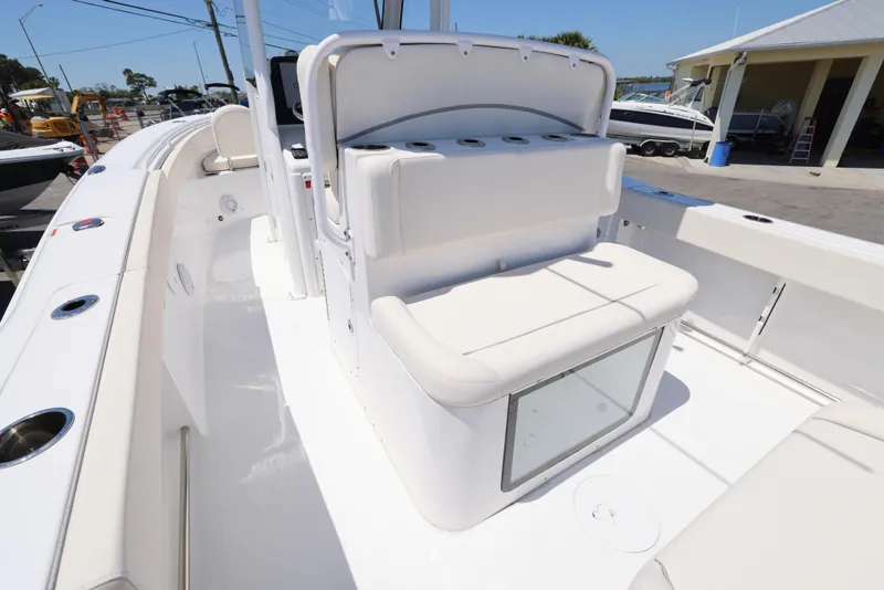 Slide: The Image of 2025 Sea Hunt Gamefish 27 Forward Seating boat interior with white cushioned seats. - 14