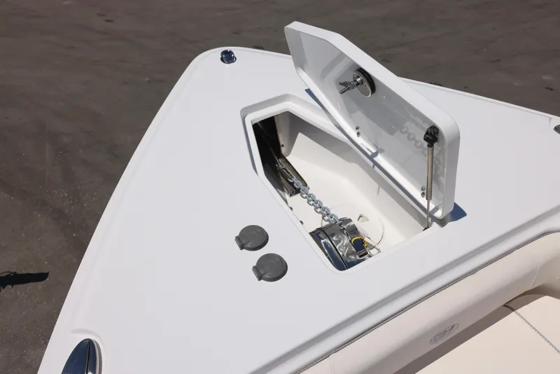 Slide: The Image of Anchor storage compartment on 2025 Sea Hunt Gamefish 27 Forward Seating boat. - 18