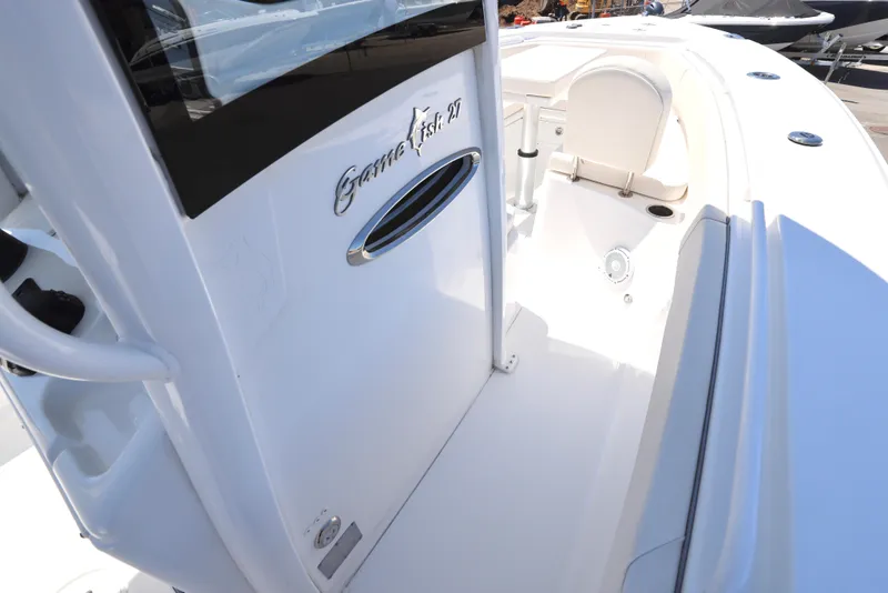 Slide: The Image of 2025 Sea Hunt Gamefish 27 Forward Seating boat interior, showcasing sleek design and spacious layout. - 20