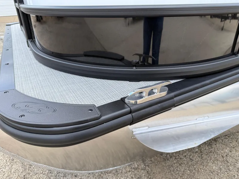 Slide: The Image of 2025 Bentley Pontoons Elite 223 Swingback Triple Log, sleek design detail, close-up view. - 11