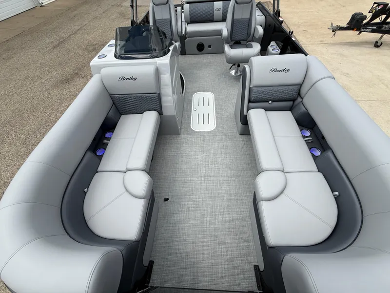 Slide: The Image of 2025 Bentley Pontoons Elite 223 Swingback Triple Log interior with luxurious seating and modern design. - 12