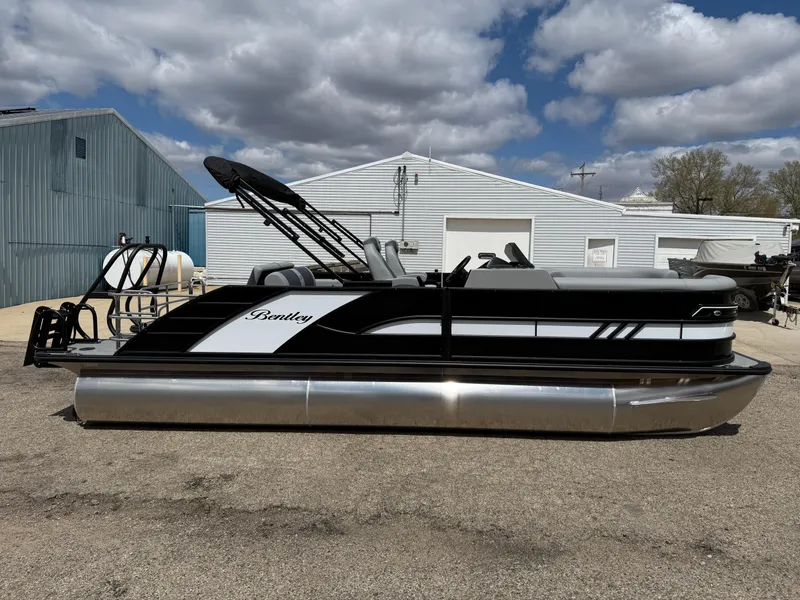 Slide: The Image of 2025 Bentley Pontoons Elite 223 Swingback Triple Log on display outdoors. - 6