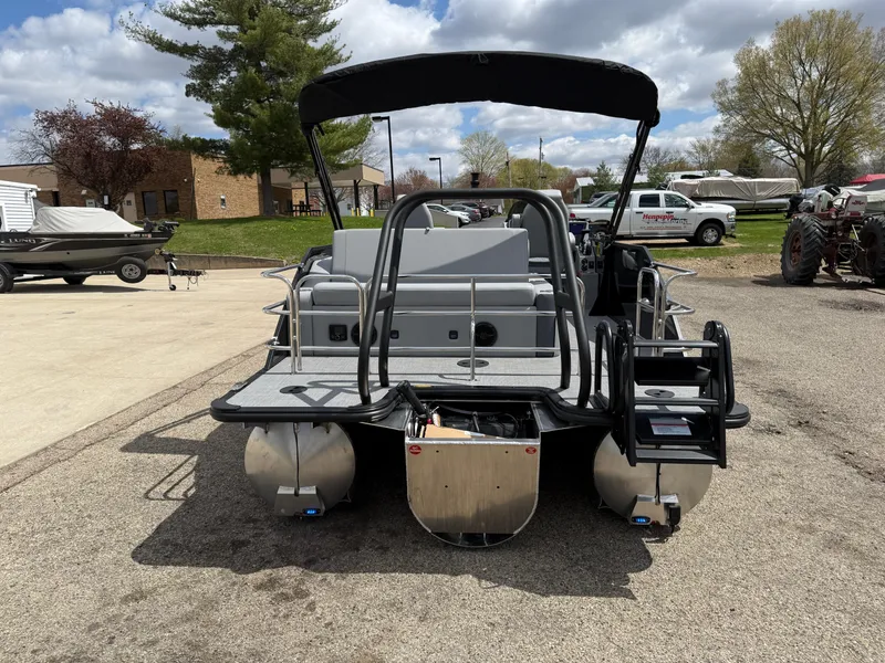 Slide: The Image of 2025 Bentley Pontoons Elite 223 Swingback Triple Log, rear view, parked outdoors. - 8