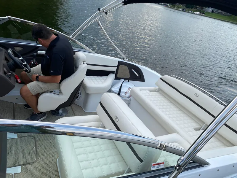 Slide: The Image of 2018 Cobalt R3 boat interior with driver on a lake. - 5