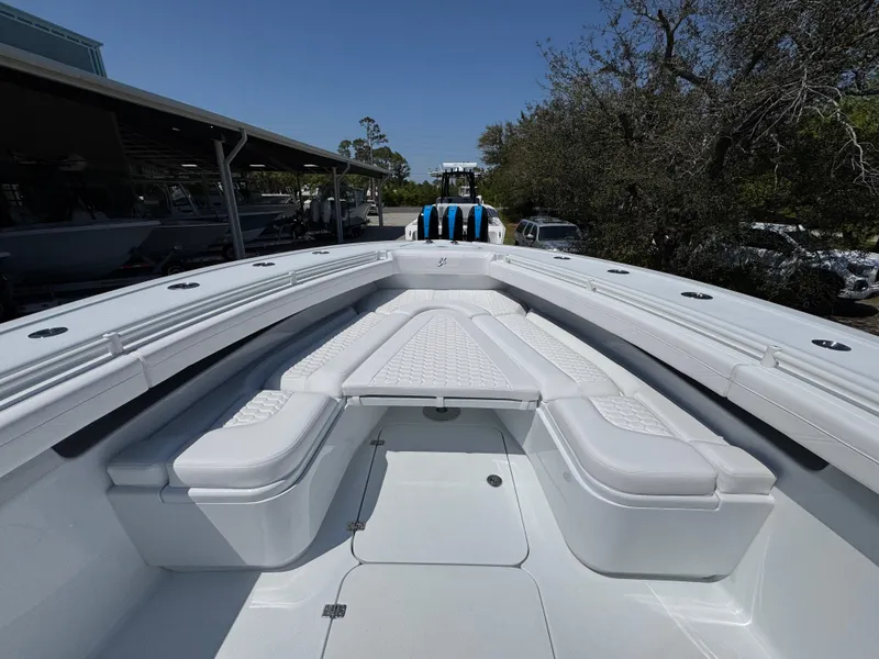 Slide: The Image of 2025 Yellowfin 36 Offshore boat with spacious seating and sleek design. - 24