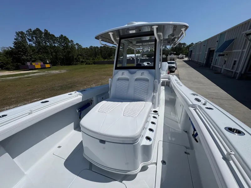 Slide: The Image of 2025 Yellowfin 36 Offshore boat with sleek white seating and modern design. - 28