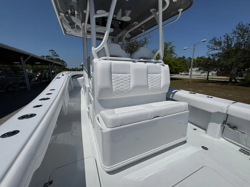 Slide: The Image of 2025 Yellowfin 36 Offshore boat with sleek white seating and spacious deck. - 39