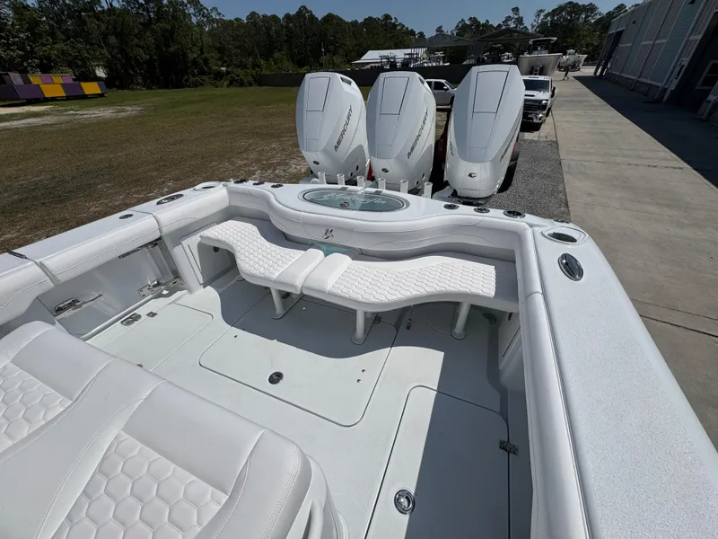 Slide: The Image of 2025 Yellowfin 36 Offshore boat with triple engines and spacious seating area. - 41