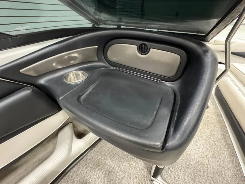 Slide: The Image of 2006 Crownline 21 Classic boat interior with black and silver detailing. - 11