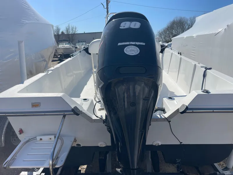 Slide: The Image of 2011 Carolina Cat 18CC boat with 90HP outboard motor, rear view. - 5