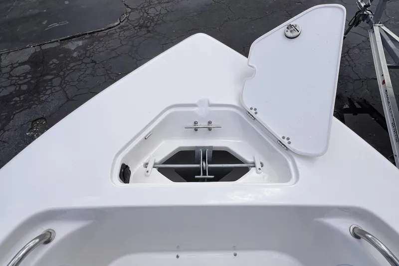 Slide: The Image of Bow of 2025 Key West 203 FS boat with open anchor locker. - 17