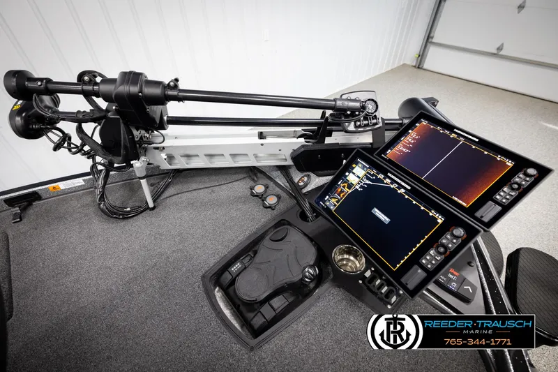 Slide: The Image of 2023 Ranger Z 521R boat dashboard with advanced navigation and control systems. - 47