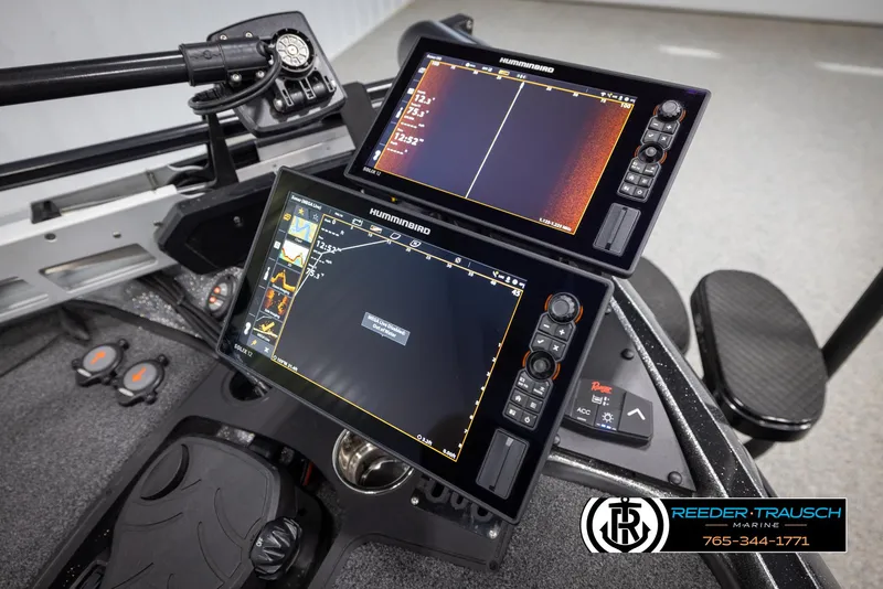 Slide: The Image of 2023 Ranger Z 521R boat dashboard with dual Humminbird fish finders and controls. - 48