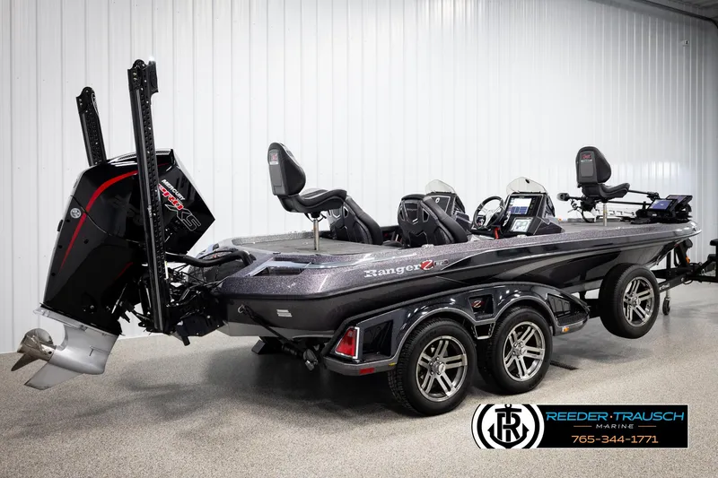 Slide: The Image of 2023 Ranger Z 521R bass boat with dual seats and powerful outboard motor. - 5
